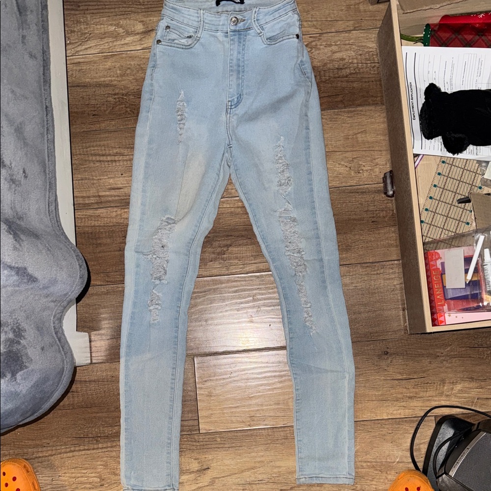 Fashion Nova Light Blue High Rise Distressed Jeans